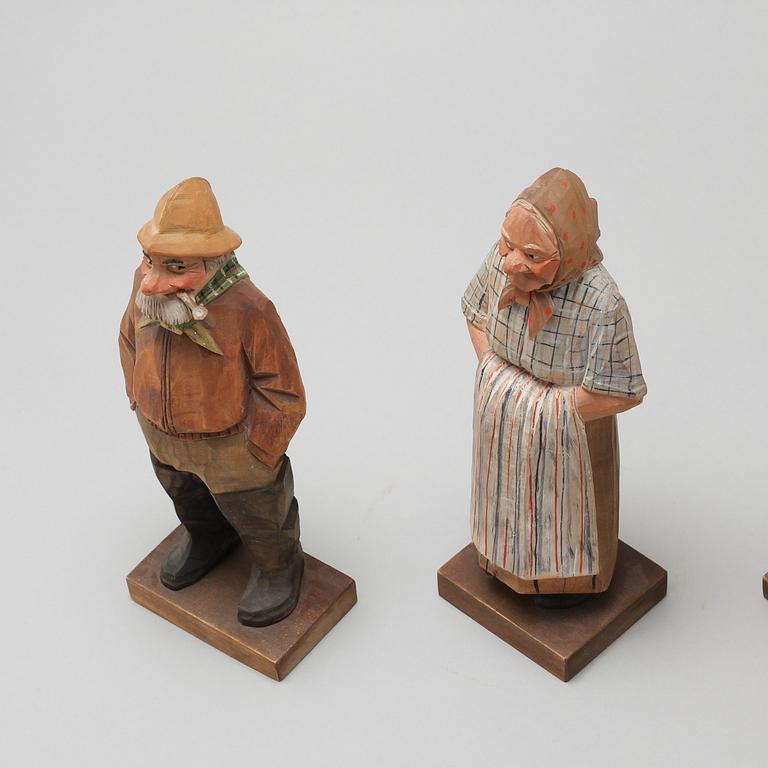 and CARL JOHAN TRYGG, three wooden sculptures, signed and dated, 1940s.