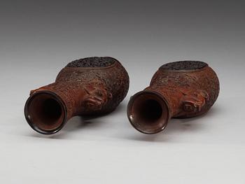 A pair of carved wooden and tortoise shell inlayed vases, presumably late Qing dynasty (1644-1912).
