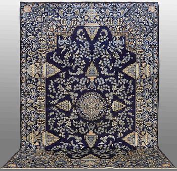 A CARPET, Kashan , signed, around 410 x 277 cm.