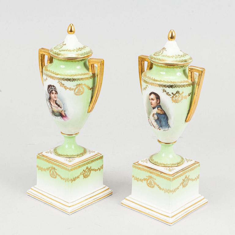 A pair of porcelain urns, possibly naples, first half of the 20th century.
