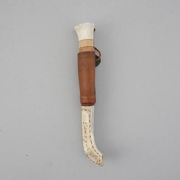 A Sami reindeer horn knife, unidentified signature.