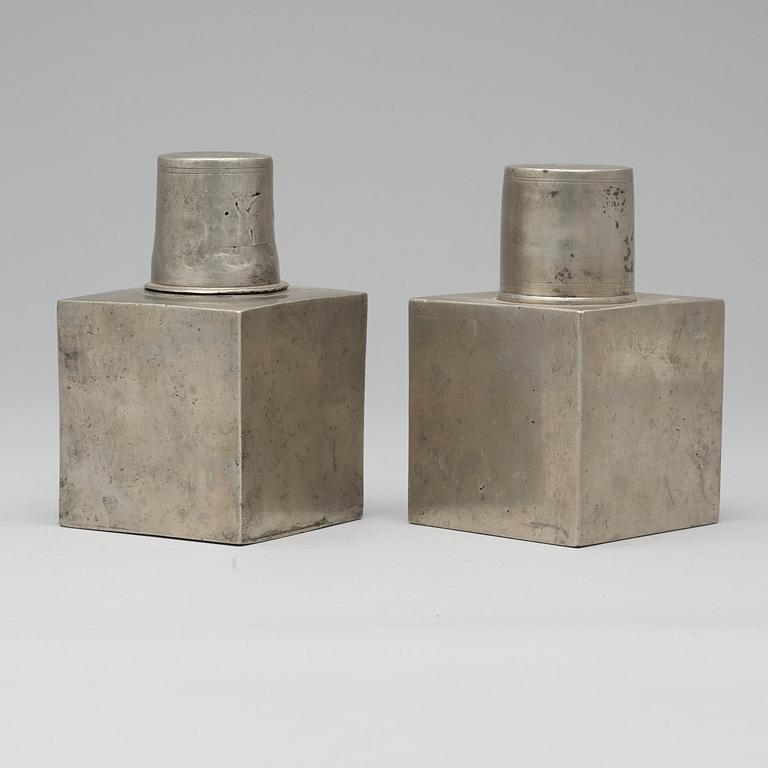 Two pewter flasks by H Wicksten, master 1782.
