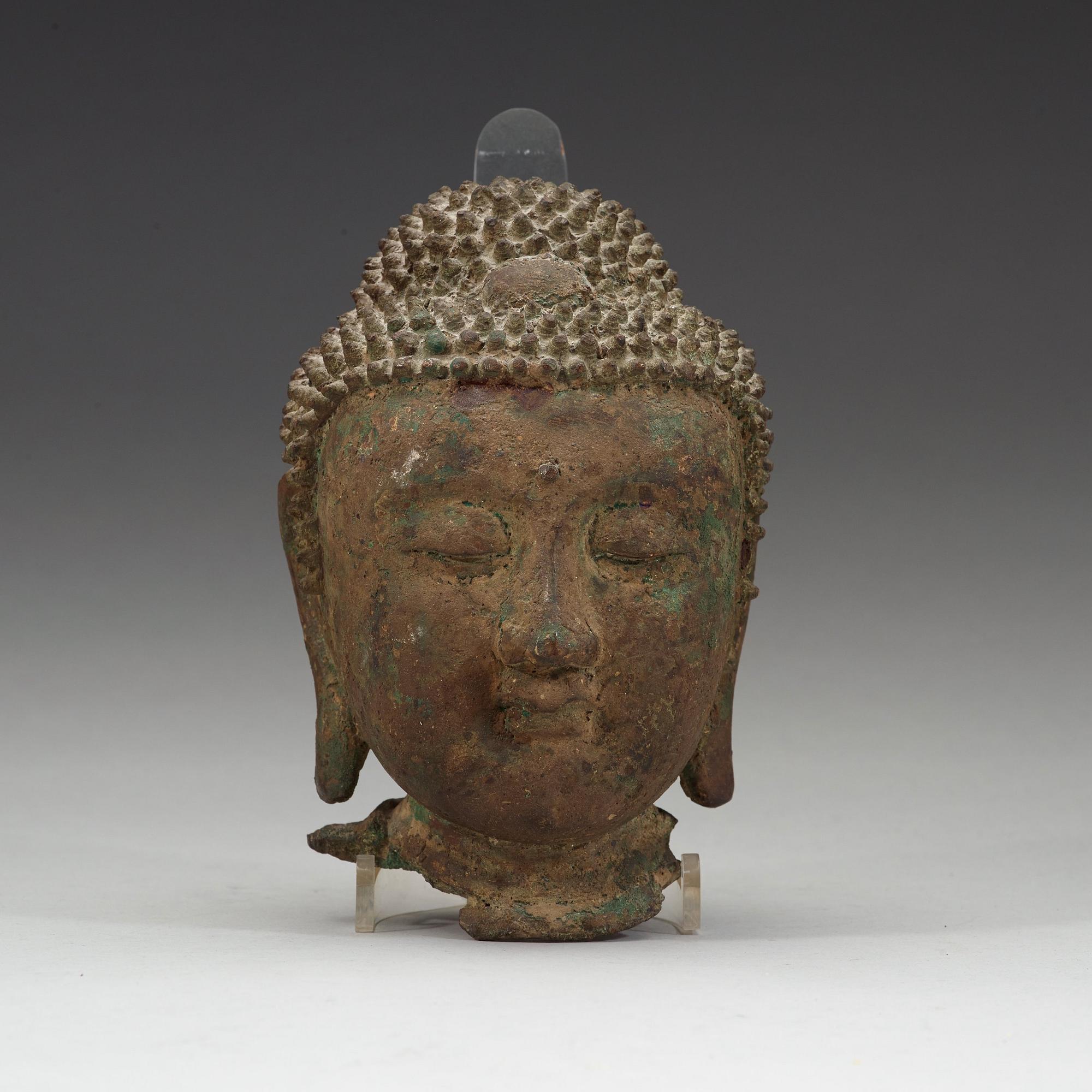 A bronze head of buddha, Ming dynasty (1368-1644).