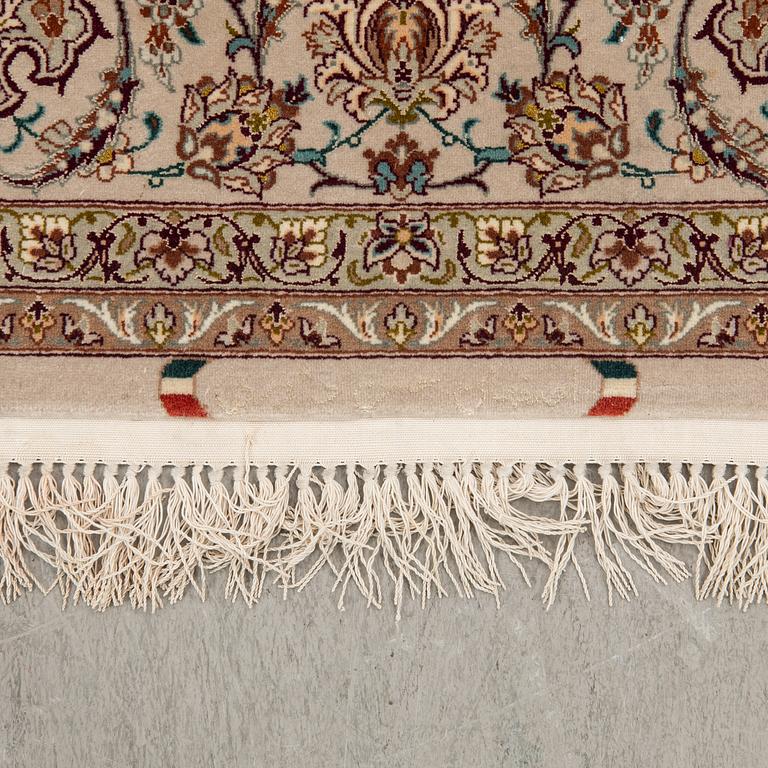 An Isfahan rug, central Persia, signed, 228 x 150 cm.