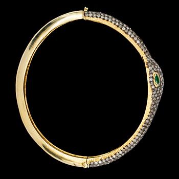 A rose cut diamond bangle, with eyes of tsavorites, tot. app. 4 cts.