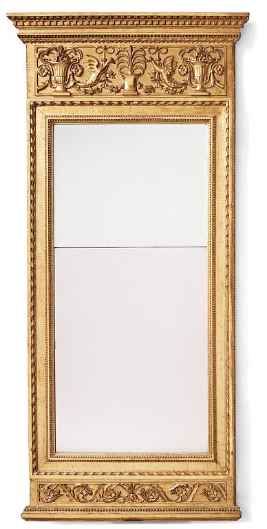 A late-Gustavian giltwood mirror, Stockholm, late 18th century.