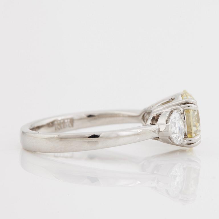 A brilliant- and heart cut diamond ring.