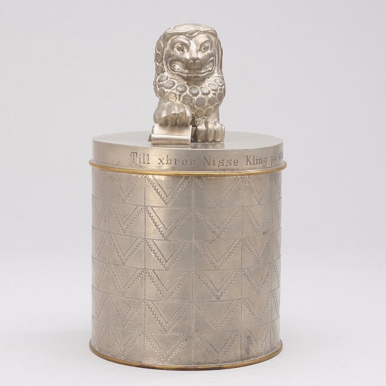 An Anna Petrus pewter and brass lidded jar, Svenskt Tenn, Stockholm 1928.