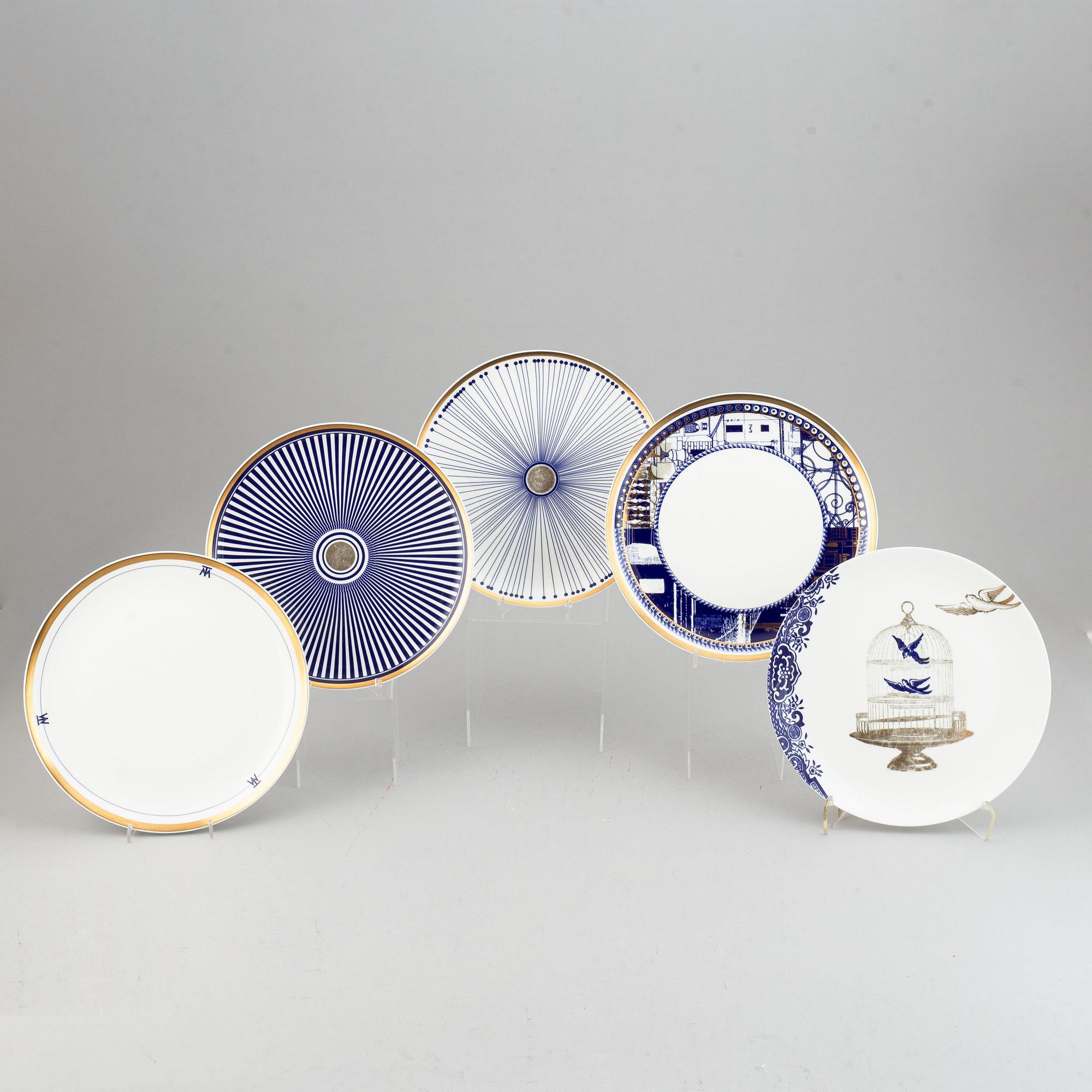 A 24 pcs bone china service from Flux Stoke on Trent, different motives and designers, designed in 2012. England.
