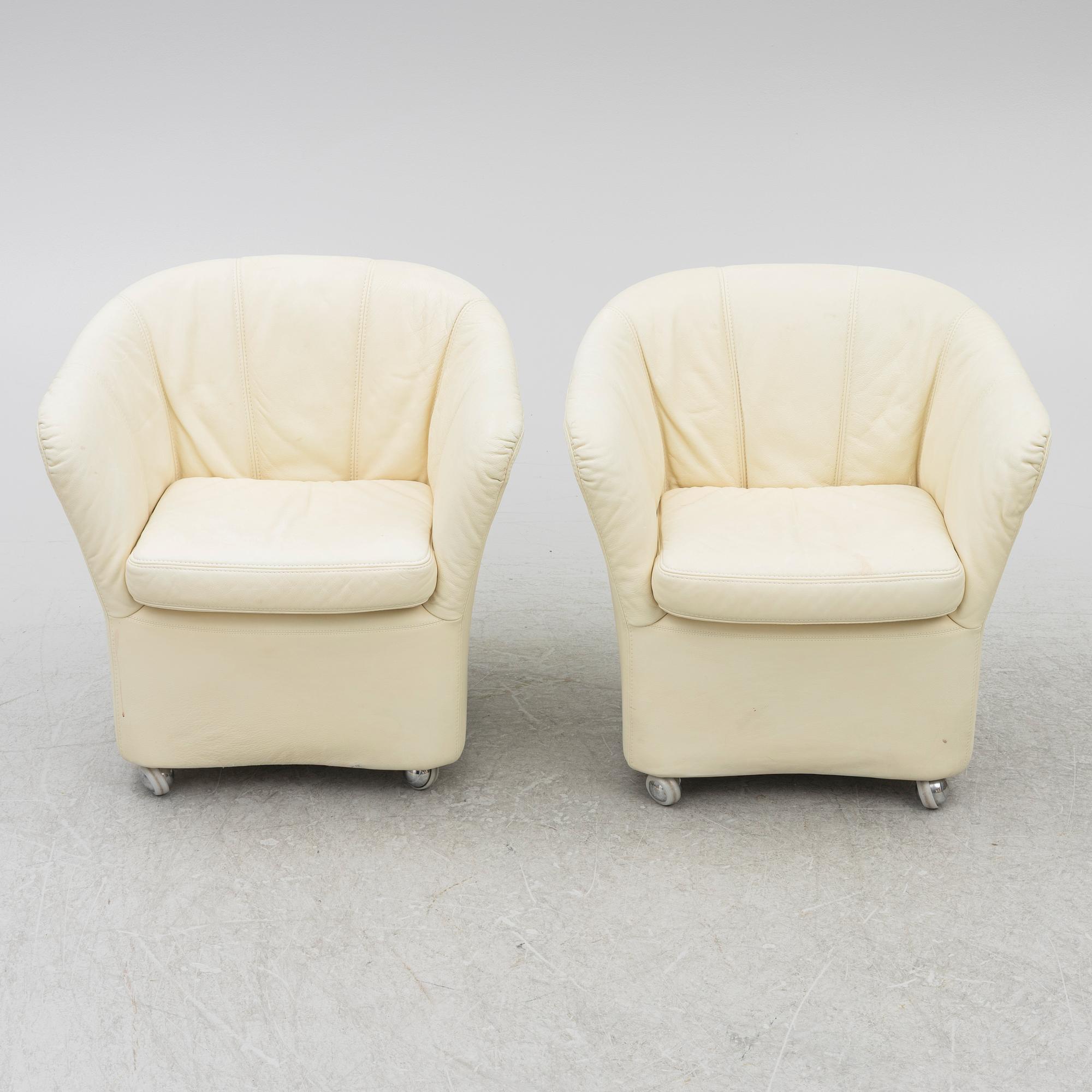 A pair of leather armchairs, Dux, Sweden, 1980's.