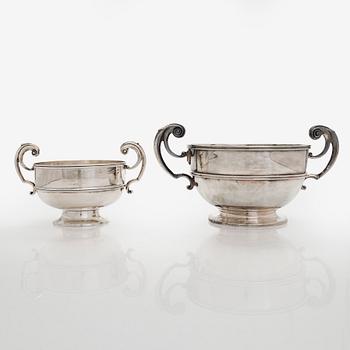 A set of two bowls with handles, sterling silver, England.