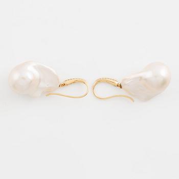 Cultured freshwater pearl and brilliant cut diamond earrings.