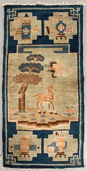 A semiantique Chinese Baotou carpet ca 120x63 cm.