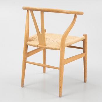 Hans J. Wegner, a set of four model 'CH-24' chairs, Carl Hansen & Søn, Denmark.