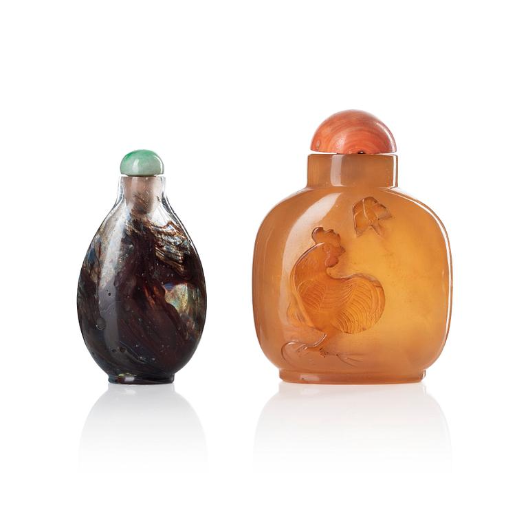 Two Chinese snuff bottles with stoppers, 20th Century.