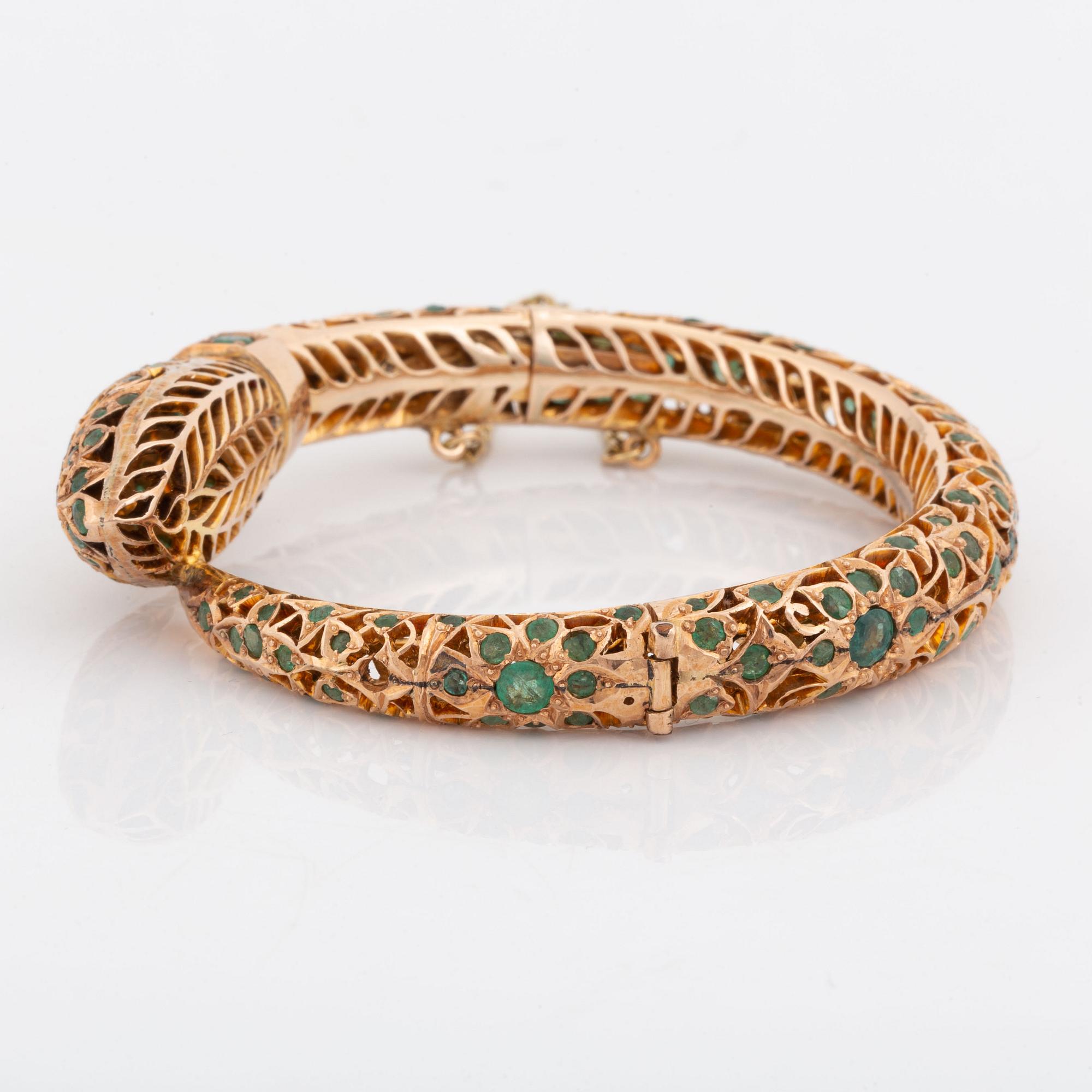 Armring,  i form av orm 14K guld med smaragder.