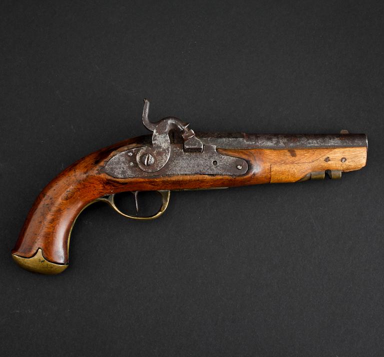An early 19th century cap lock revolver.