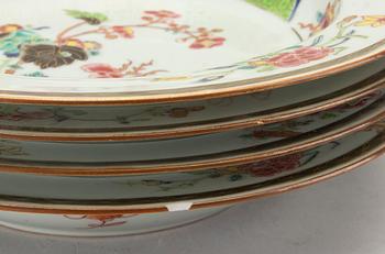 A set of four Chinese famille rose Qianlong porcelain plates.