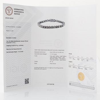 Round brilliant-cut diamond rivière bracelet, with IGI report.