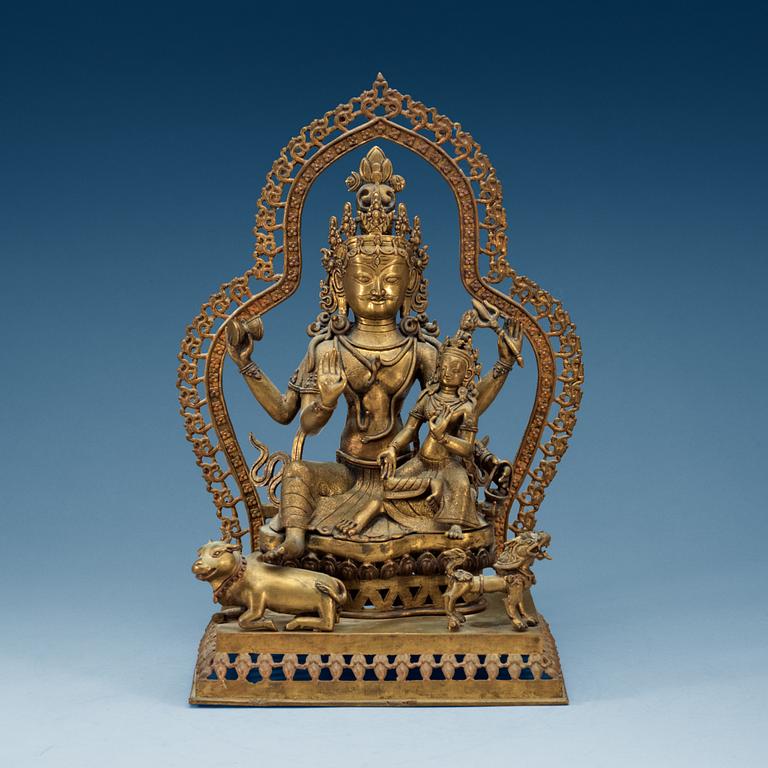 An Indian bronze figure group representing Shiva Parvati, 19th Century.