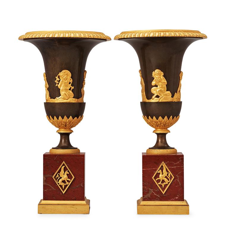 A pair of French Empire early 19th century urns.