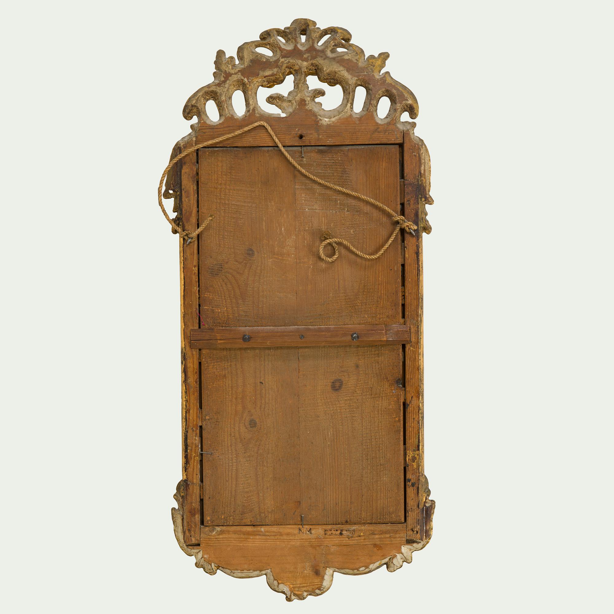 A Rococo giltwood mirror by Nils Meunier (master in Stockholm 1754-97, royal court mirror maker 1769).