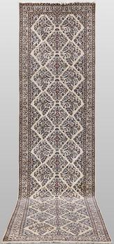 A Nain part silk carpet, 408 x 98 cm.