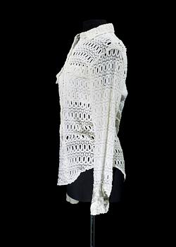 A white cottonlace shirt by Anna Sui.