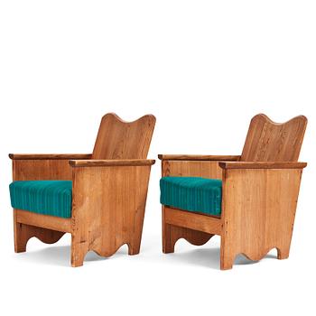 Axel Einar Hjorth, a pair of "Utö" stained pine armchairs, Nordiska Kompaniet 1930s.