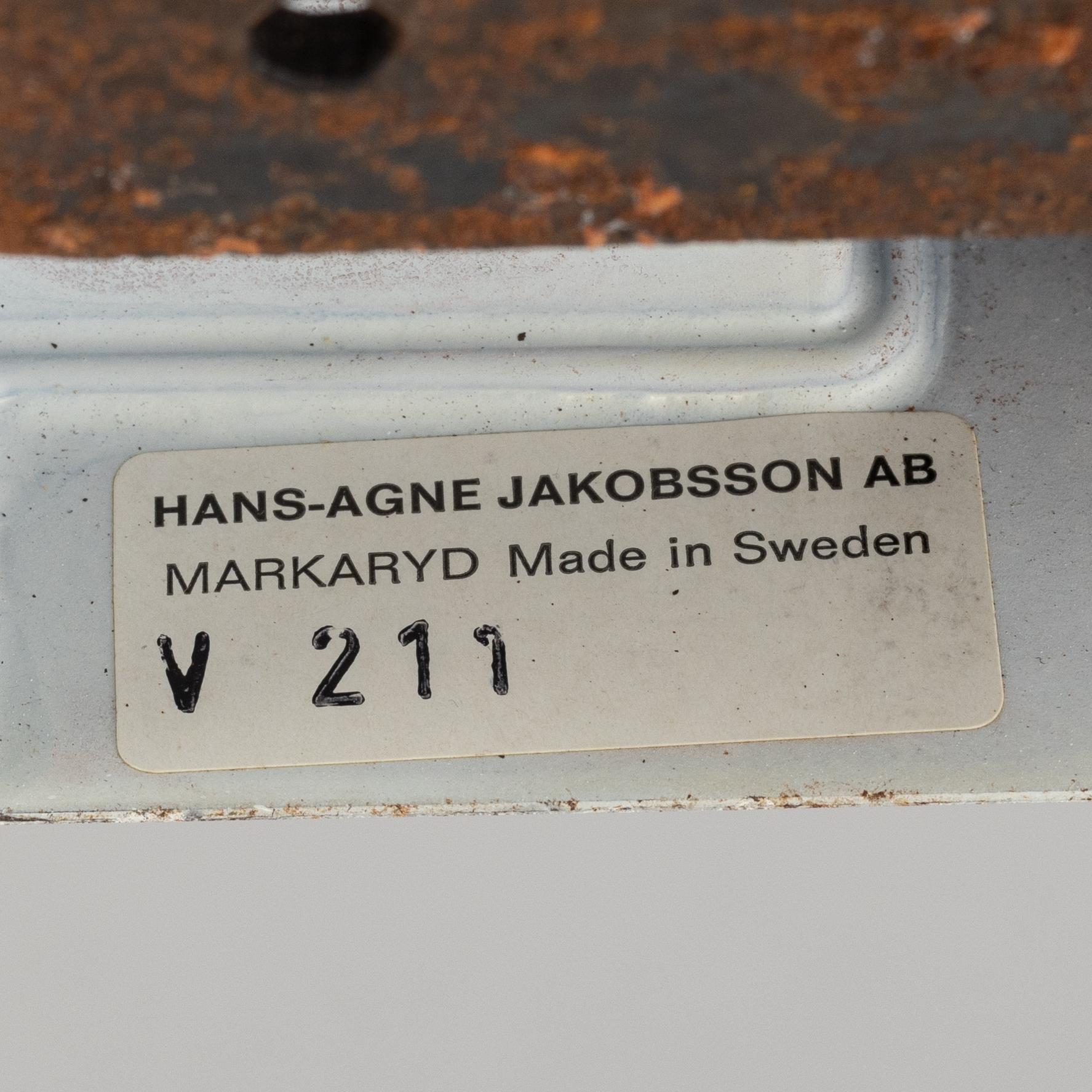 Hans-Agne Jakobsson, a pair of beech and plastic wall light, Markaryd, second half of the 20th century.
