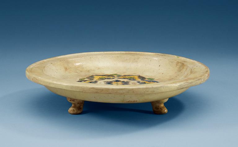 A sancai glazed tripod dish, Tang dynasty, (618-907 AD.).