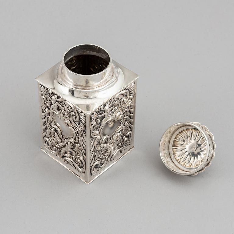 A silver tea caddy, mark of William Comyns & Sons,  London 1898.