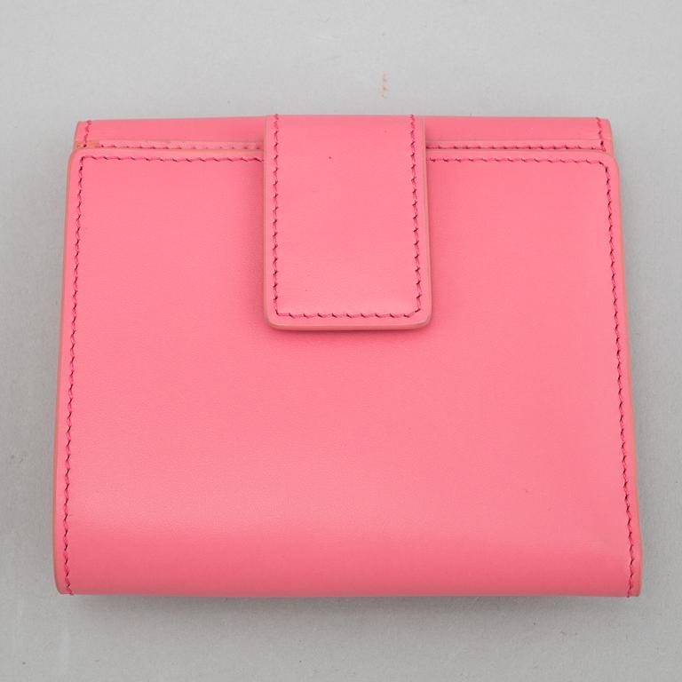 Roger Vivier, a pink leather wallet.