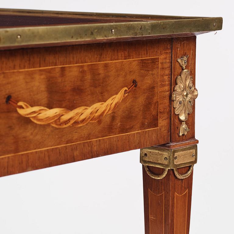 A Gustavian marquetry and gilt brass-mounted table by G. Iwersson (master in Stockholm 1778-1813).