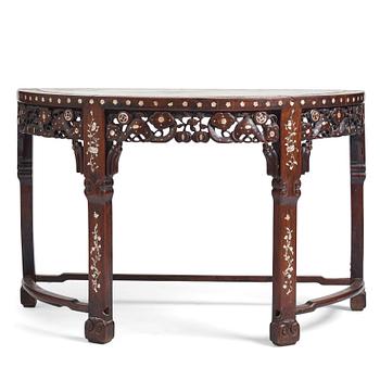 1023. A Chinese hardwood demi-lune side table with mother-of-pearl inlays, late Qing dynasty.