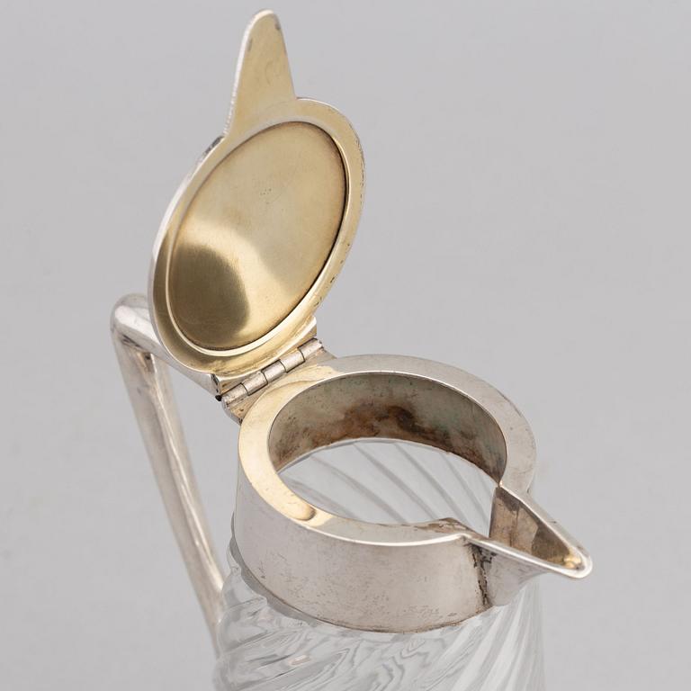A German glass and silver carafe, mark of Wilhelm Binder, Bremen, Schwäbisch Gmünd, circa 1900.
