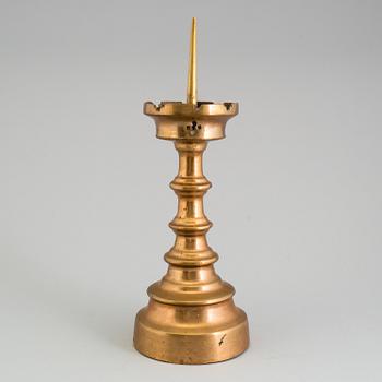 A GOTHIC STYLE BRONZE CANDLESTICK, 19th century.