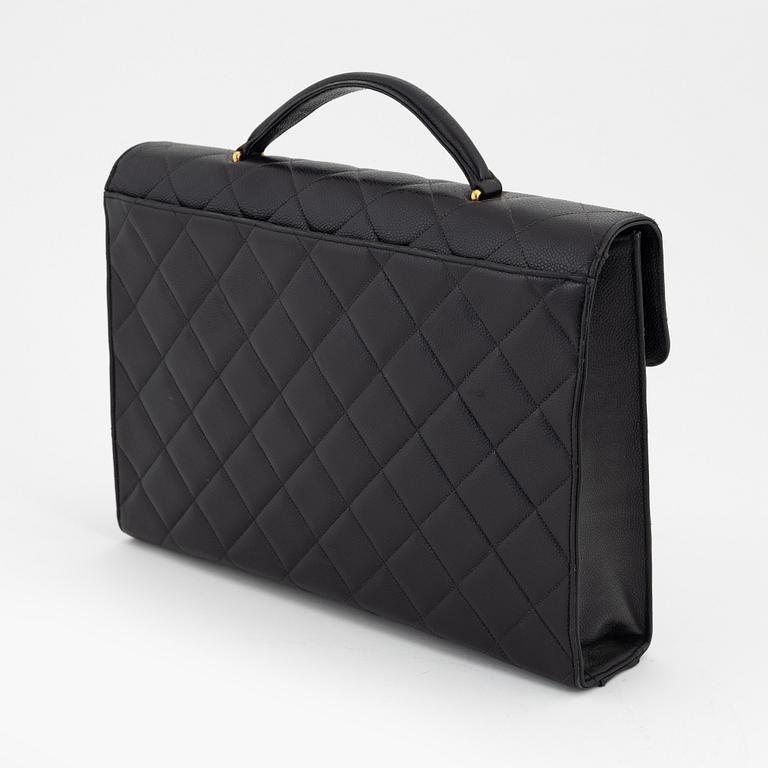 Chanel, a black caviar leather briefcase.