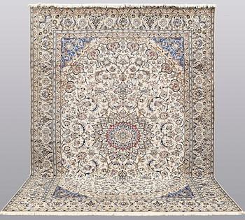 A carpet, Nain part silk, 364 x 256 cm.