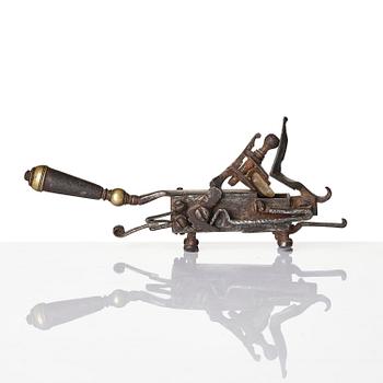 A mechanical flintlock igniter, later part 18th century/early19th century.