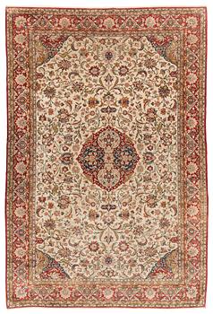 A mid 20th century central persian silk Qum carpet, c. 320 x 212 cm.