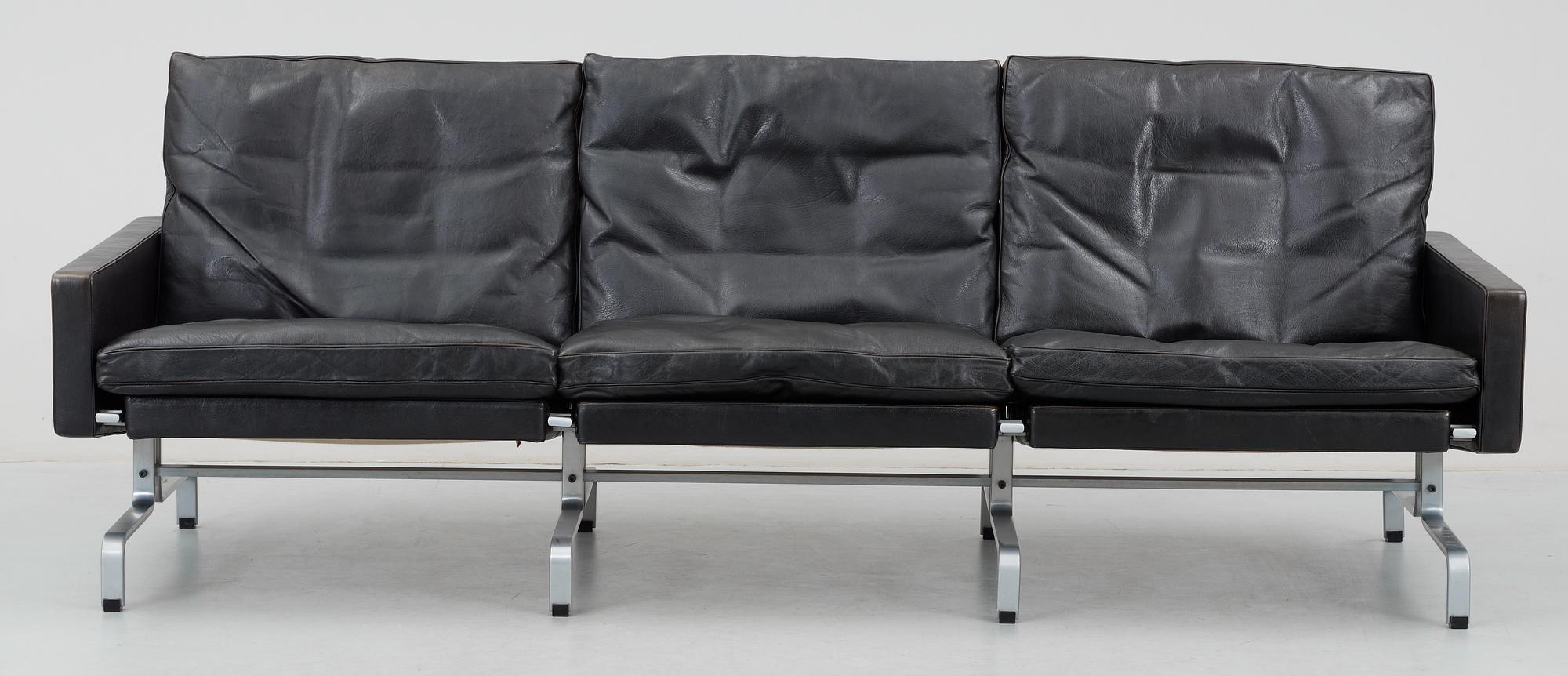 A Poul Kjaerholm black leather and steel base "PK-31-3" sofa, maker's mark E Kold Christensen, Denmark.