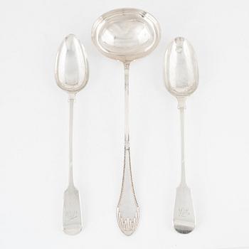 A Silver Soup Ladle and two Serving Spoons, one with mark of Elizabeth & John Eaton, London 1859.