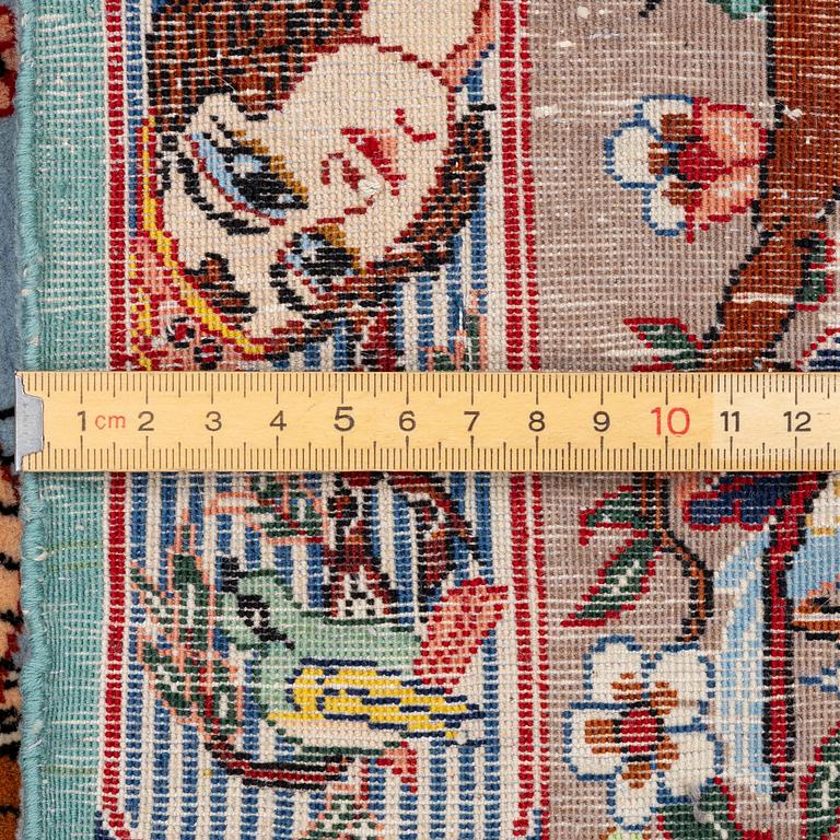 An Isfahan figural rug, c. 112 x 148 cm.
