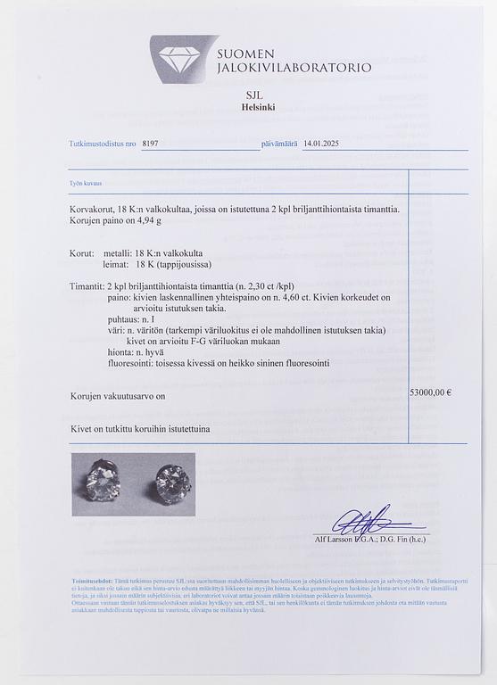 A pair of brilliant-cut diamond stud earrings in 18K white gold.