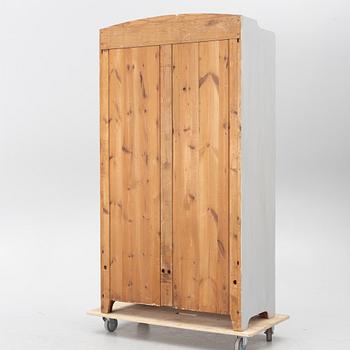 Display cabinet, early 20th century.