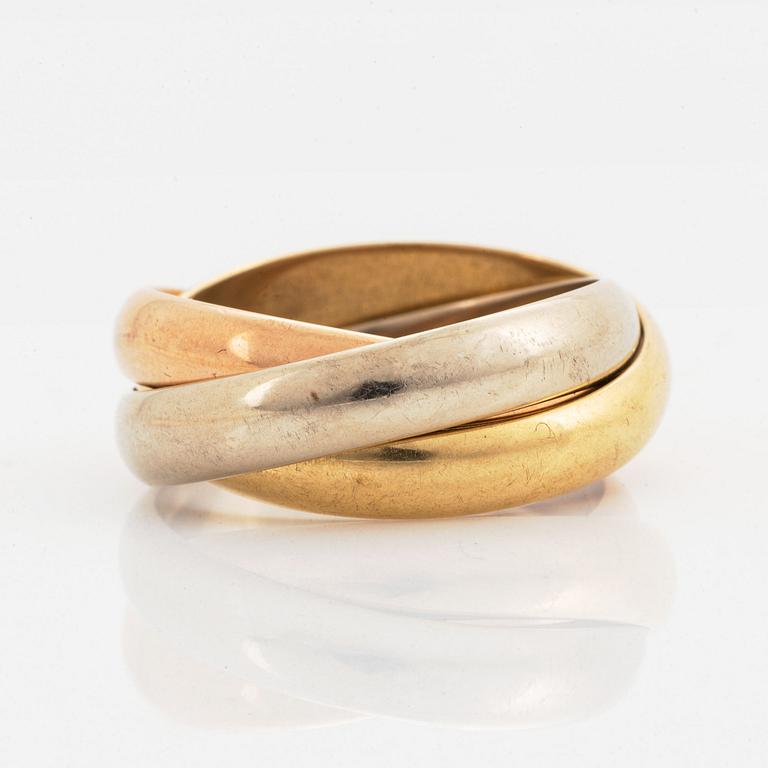 An 18K white, rose and yellow gold ring.