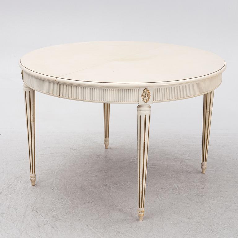 A Gustavian style dining table with ten chairs, Sweden, mid/second half of the 20th century.