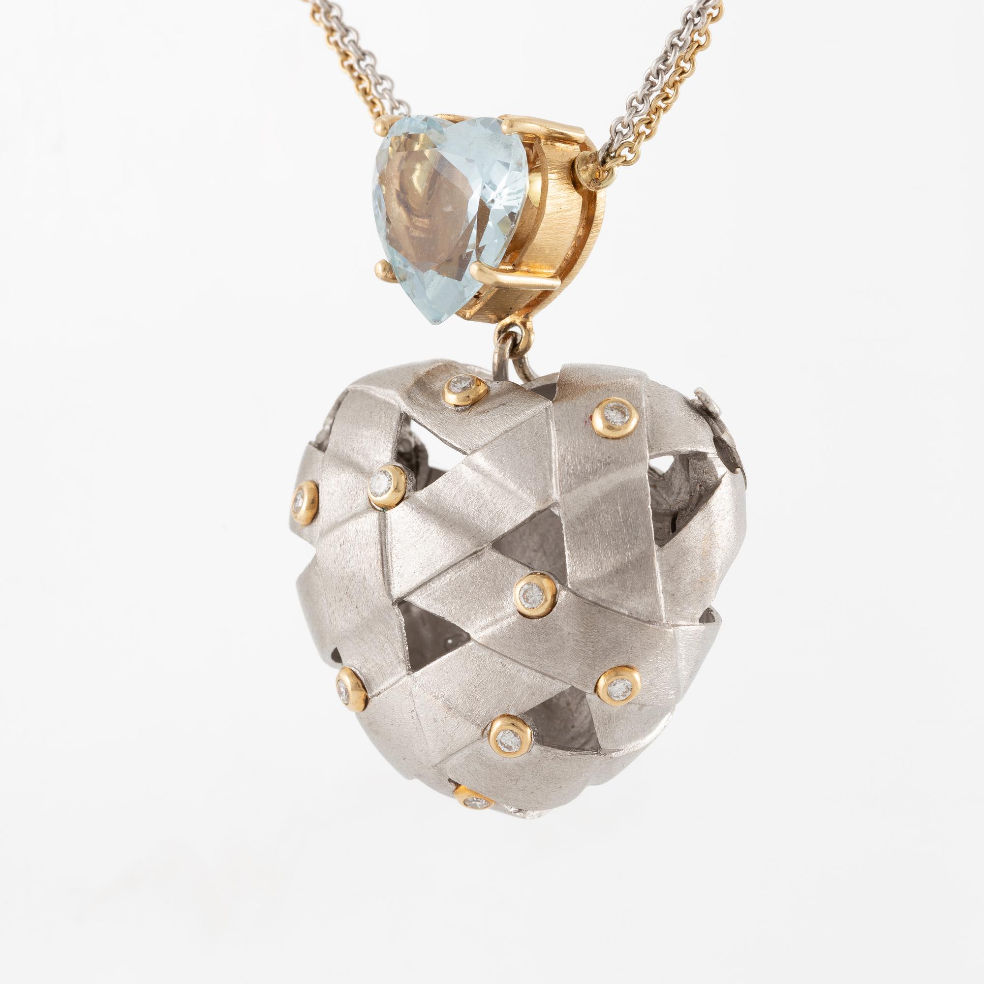 Ole Lynggaard, necklace in 18K gold and white gold with a heart-shaped aquamarine and brilliant-cut diamonds.