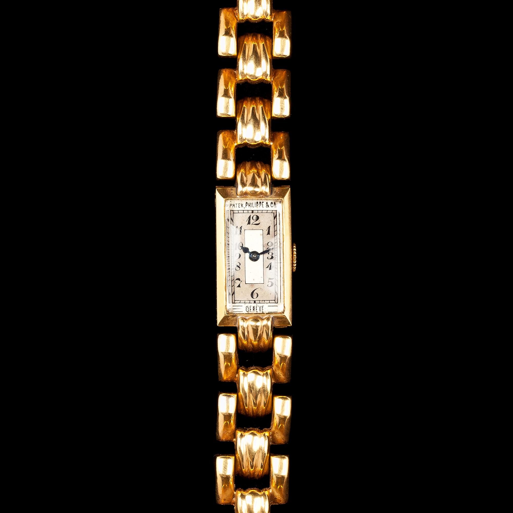 A Patek Philippe ladie's gold wrist watch.